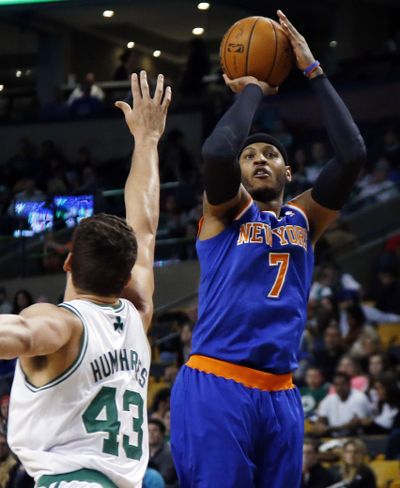 New York forward Carmelo Anthony had 34 points and nine rebounds in Knicks’ 116-92 win over Celtics. (Associated Press)