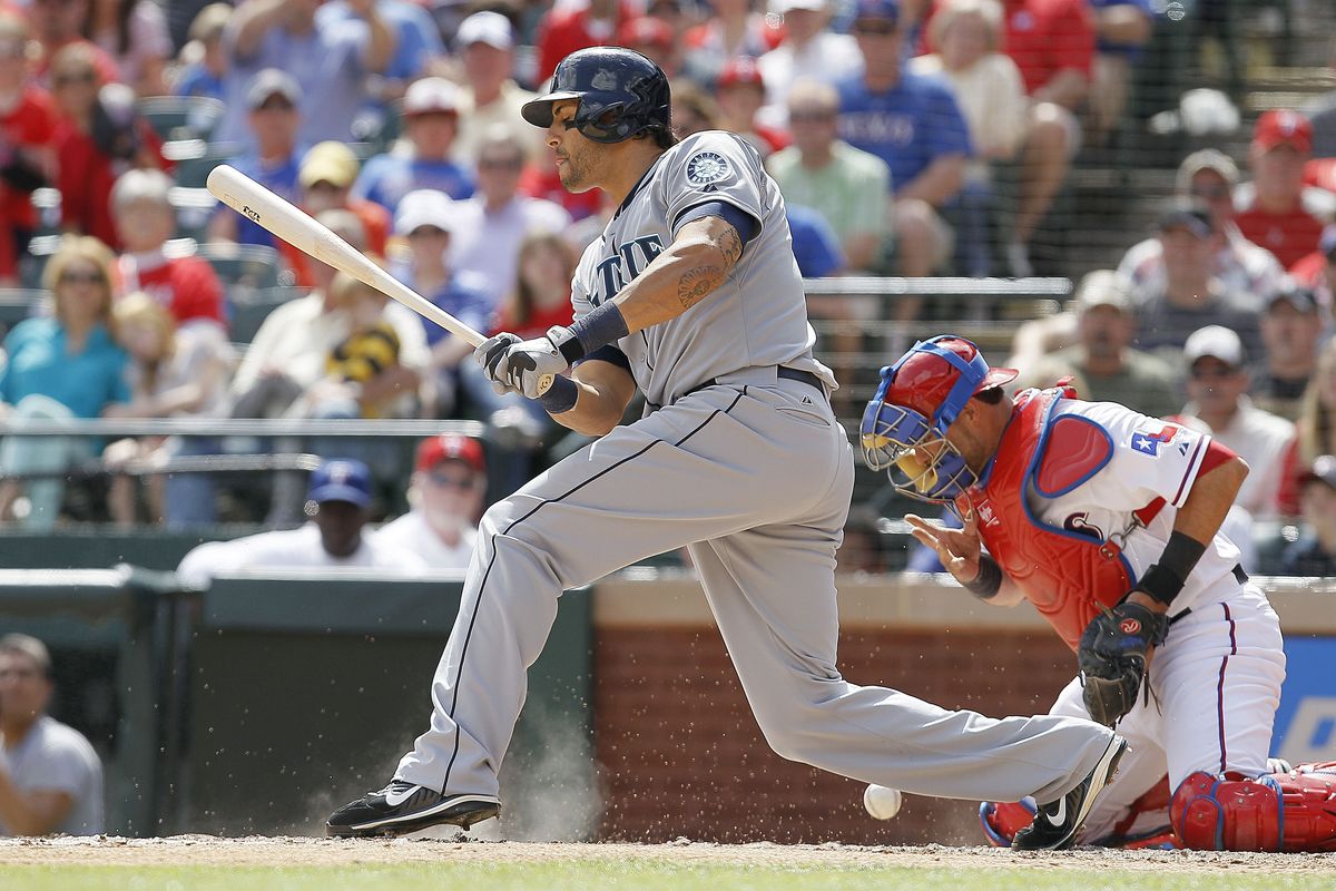 Texas catcher Geovany Soto blocks the ball after Michael Morse struck out in fifth inning Sunday, one of 32 Mariners strikeouts in three games. (Associated Press)
