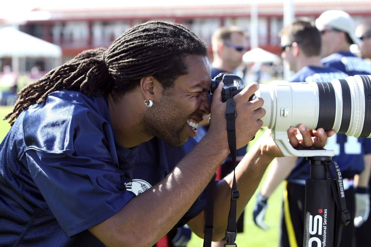 The Arizona Cardinals’ Larry Fitzgerald has traveled the world taking pictures and will do a blog for National Geographic. (Associated Press)