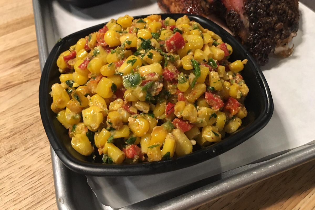 The roasted corn salad is meant to evoke elote, or Mexican street corn. (Adriana Janovich / The Spokesman-Review)
