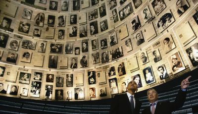 Democratic presidential contender Sen. Barack Obama stands with museum director Avner Shalev in the Hall of Names at the Yad Vashem Holocaust Museum in Jerusalem on Wednesday.  (Associated Press / The Spokesman-Review)