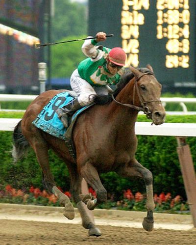 
Jockey Jeremy Rose, up on Afleet Alex, celebrates as they approach the finish line to win the Belmont Stakes.
 (Associated Press / The Spokesman-Review)