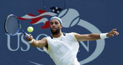 
American James Blake returns a shot during Saturday's third-round win over Rafael Nadal  at the U.S. Open. 
 (Associated Press / The Spokesman-Review)