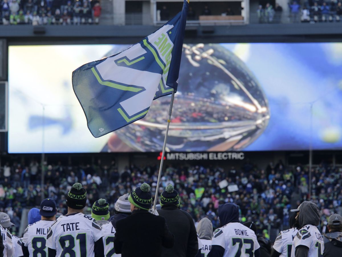 Seahaws parade through Seattle in front of 700,000 fans - Feb. 6, 2014 ...