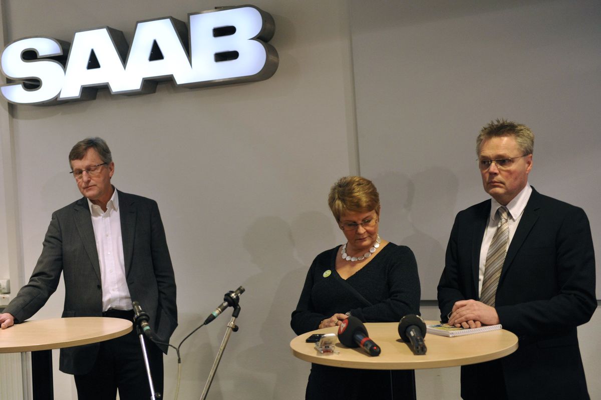 Saab Managing Director Jan Ake Jonsson, left, Deputy Prime Minister of Sweden Maud Olofsson and Undersecretary of State Joran Hagglund, right, during a media conference Friday in Trollhattan, Sweden. General Motors  said  it will wind down Saab. Associated Press photos (Associated Press photos)
