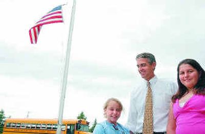 
Garwood Elementary fourth-grader Taylor Caswell, left and fifth-grader Sarah Jacobsen were chosen to take part in U.S. Space Camp at NASA in Huntsville, Ala. Jim Stein, center, of Stein's IGA in Rathdrum is sponsoring Taylor. Sarah was chosen nationally and will be sponsored by IGA Regional. 
 (Kathy Plonka / The Spokesman-Review)