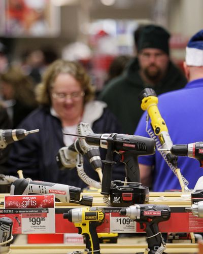 Customers wait to check out in the hardware department at a Sears store in North Olmsted, Ohio.  (Associated Press)