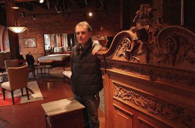 
Joel Ferris Jr. at his closed furnishings store in downtown Spokane that will be moved to North Monroe for his new venture Upscale Home Furnishings. 
 (Brian Plonka / The Spokesman-Review)