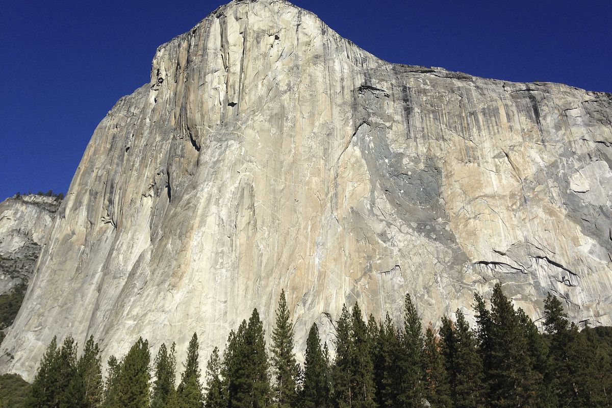 Two climbers became the first in the world to use only their hands and feet to scale a 3,000-foot vertical wall on El Capitan, a sheer slab of granite, on Wednesday in Yosemite National Park, Calif. (Associated Press)