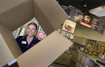 
Melissa Cocks can wrap, box and ship almost anything anywhere in the world. The young entrepreneur owns and operates two UPS franchise stores in Spokane. 
 (Christopher Anderson/ / The Spokesman-Review)