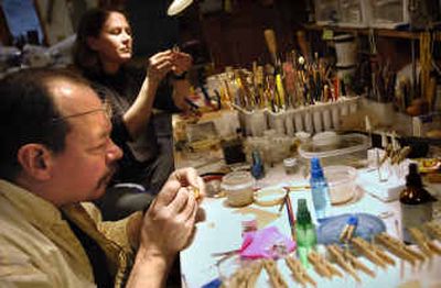 
Kurt Madison, left, and Margot Casstevens work on jewelry in their home studio in Saltese Flats.
 (Holly Pickett / The Spokesman-Review)