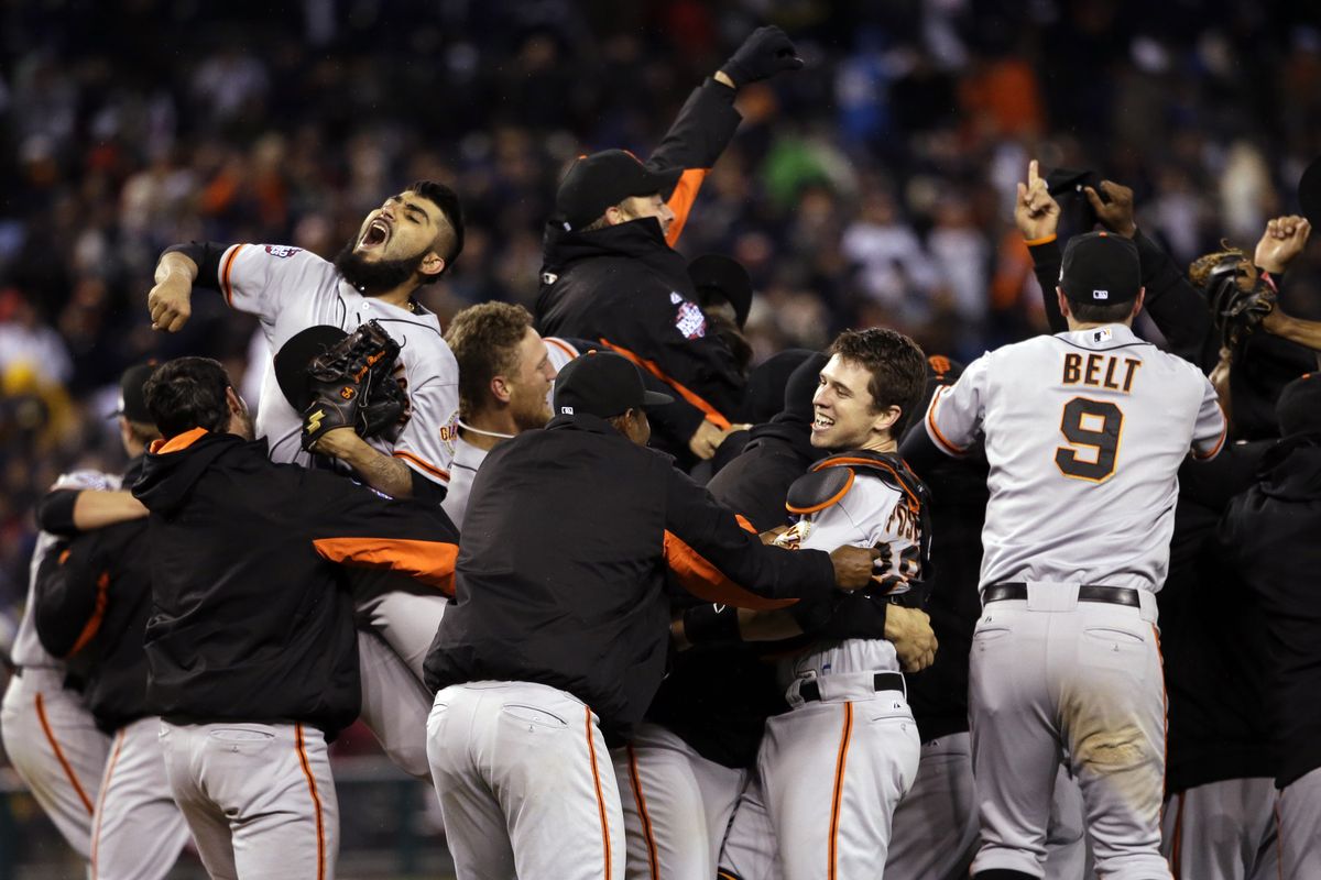 The Giants celebrate after winning the World Series over the Tigers on Sunday at Detroit’s Comerica Park. (Associated Press)