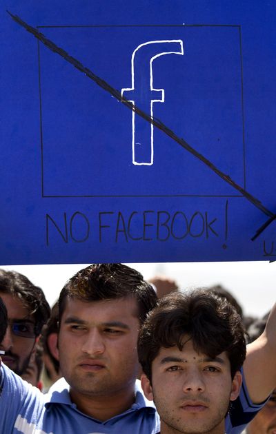 Pakistani students hold a rally against the Facebook page “Everybody Draw Mohammed Day!” in Islamabad last month.  (Associated Press)