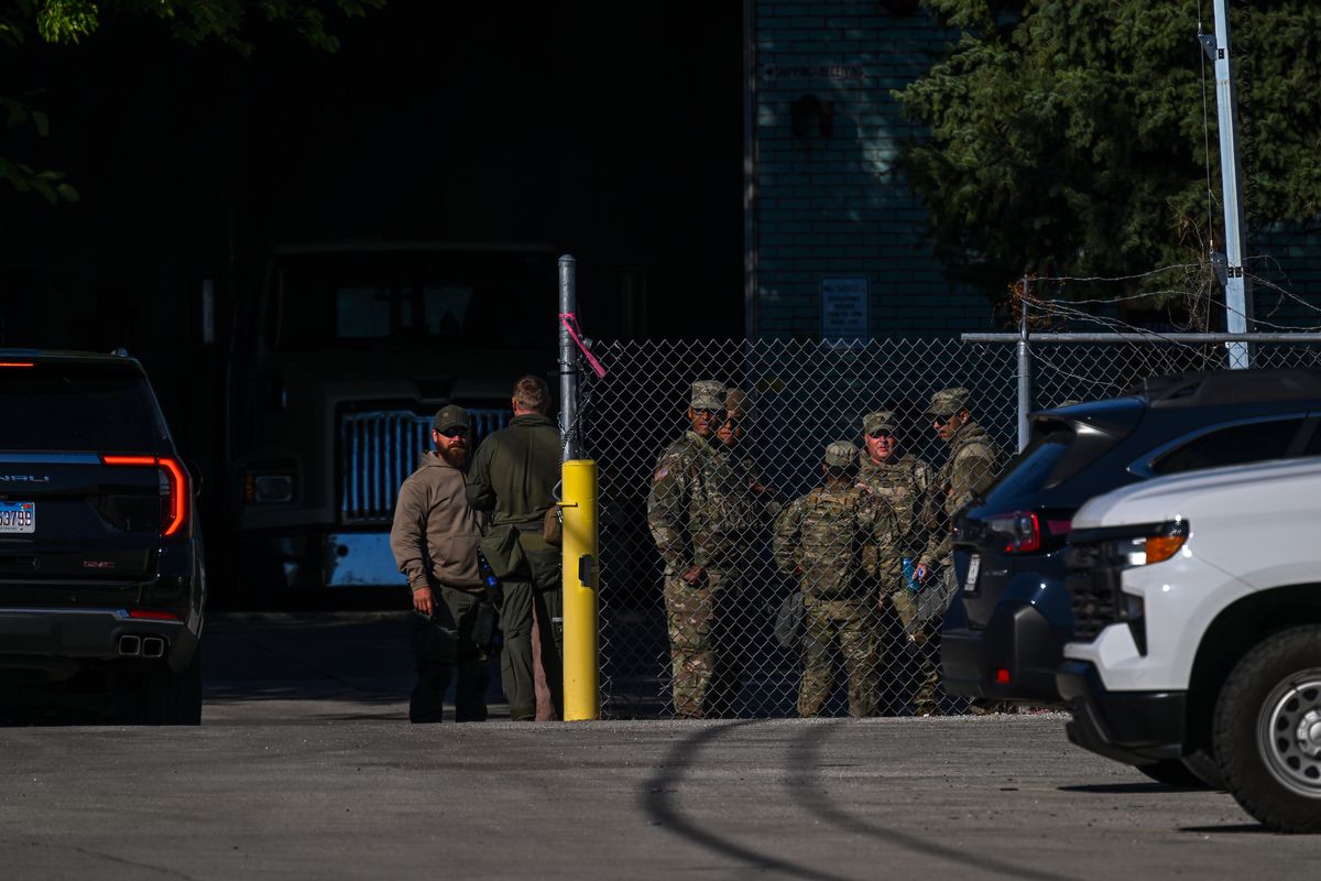 National Guard troops are seen outside the Immigration and Customs Enforcement facility on Oct. 9 in Broadview, Illinois. MUST CREDIT: Joshua Lott/The Washington Post (Joshua Lott/The Washington Post)