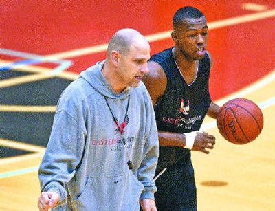 
Mike Burns, pictured with NBA draft-bound Rodney Stuckey, was 38-49 in three years as Eastern men's head basketball coach.
 (Dan Pelle / The Spokesman-Review)