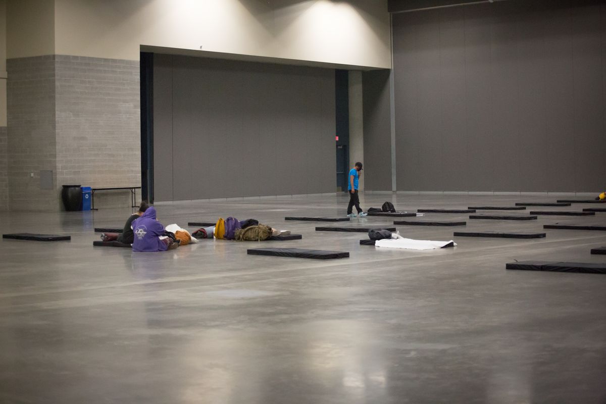 A temporary, 24-hour safer air center opened in the Spokane Convention Center under the direction of the City of Spokane on Sunday, Sept. 13, 2020 in downtown Spokane, Wash. The regional shelter is open to anyone who needs respite from the hazardous air quality caused by wildfire smoke; before citizens enter the facility, which is monitored by security and sanitized regularly as a COVID-19 precaution, guests will have their basic identification details taken down and can then access the socially distanced sleeping mats and meals.  (Libby Kamrowski/The Spokesman-Review)