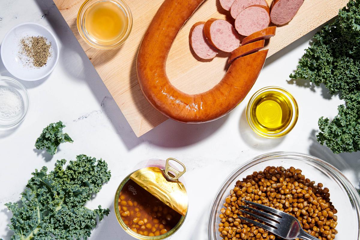 Skillet Lentils and Kale With Turkey Kielbasa for quick, easy dinner. (Photos by Rey Lopez; food styling by Nicola Justine Davis/For The Washington Post)
