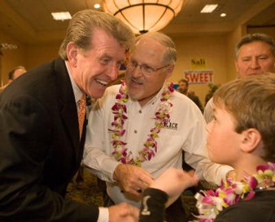 
Republican candidate Butch Otter, left, greets supporters Tuesday  in Boise. He was in the lead for governor Tuesday night. 
 (Associated Press / The Spokesman-Review)
