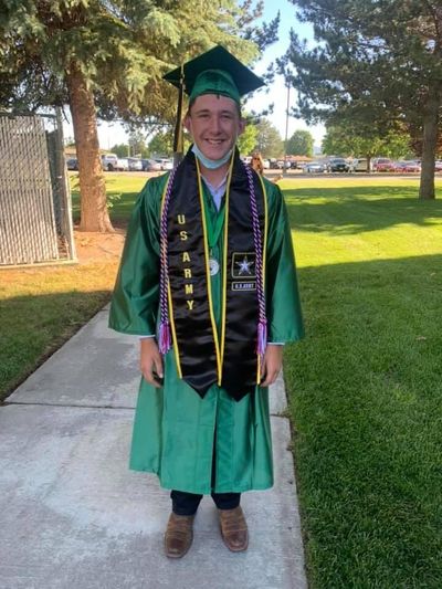 Chase Wiedmer, brother to Quinton Wiedmer, is pictured with his military stole during East Valley’s 2021 graduation. The East Valley School District had prohibited stoles to be worn during the school’s graduation ceremony, but has since reversed the policy for military stoles.  (Courtesy photo)