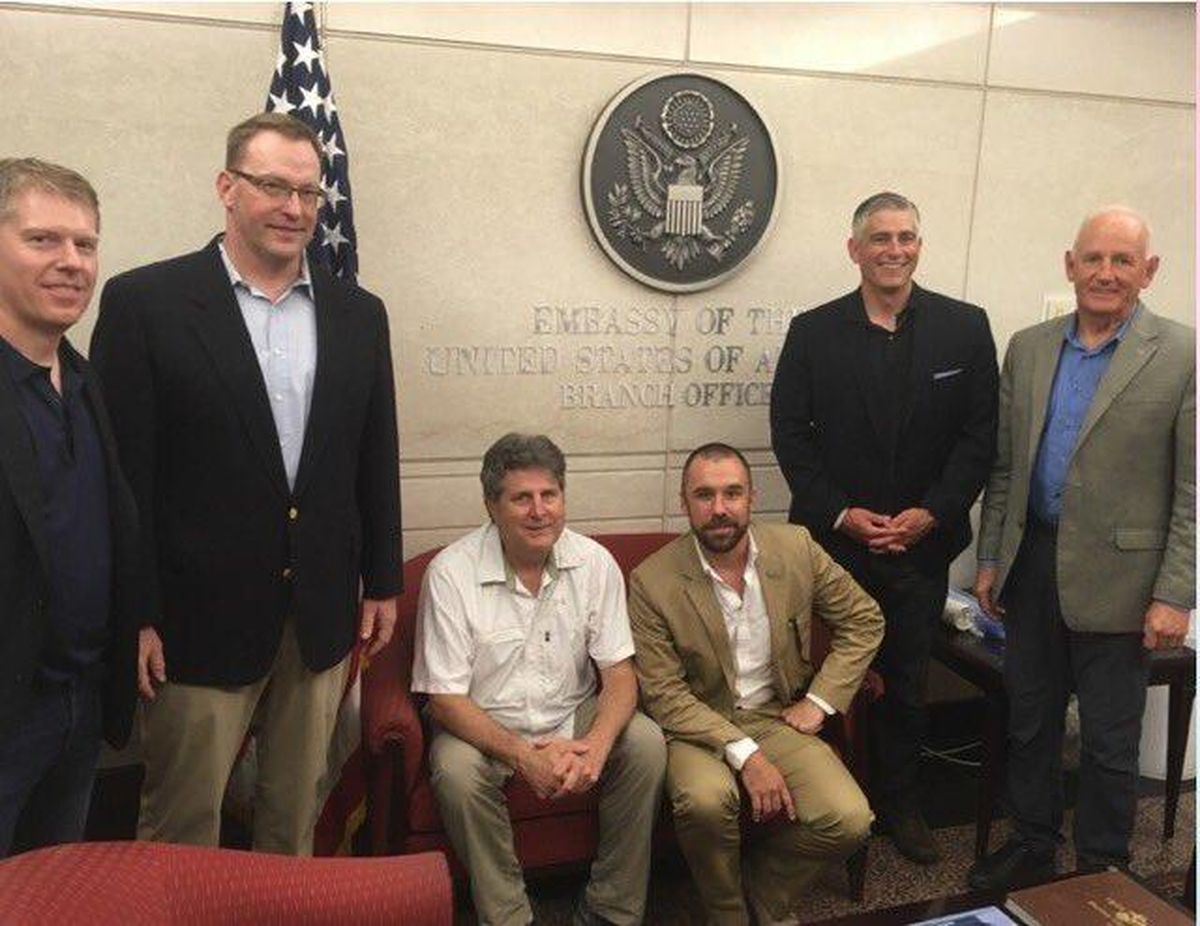 Mike Leach (center left) and Michael Baumgartner (second to right) pose after briefing with members of the U.S. State Department in Tel Aviv, Israel. (Mike Leach/Twitter)
