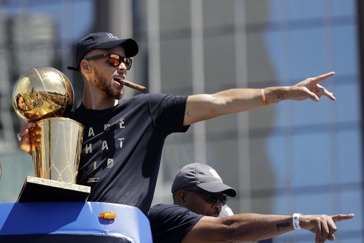 As far as Norman Chad is concerned, Stephen Curry and the Golden State Warriors might as well plan their victory parade today. (Marcio Jose Sanchez / Associated Press)