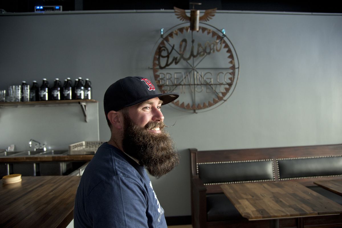 Markus Lowe serves as tap room manager at the new Orlison Brewing Co. Tavern at 1017 W. First Avenue in Spokane. (Dan Pelle)