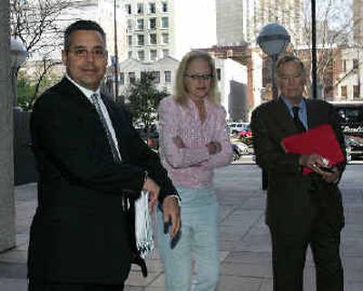 
Plaintiffs' attorneys Richard A. Sandoval, left, Margaret Branch and Turner W. Branch enter the Federal court house Friday in New Orleans for the first pre-trial hearing in the Vioxx liability case. 
 (Associated Press / The Spokesman-Review)