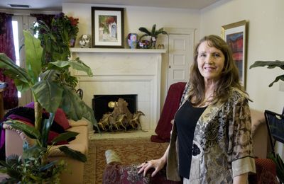 Therapist Elizabeth Scott will be showing her work at Ink to Media in the Valley through January. Her work decorates her office.  (Colin Mulvany / The Spokesman-Review)