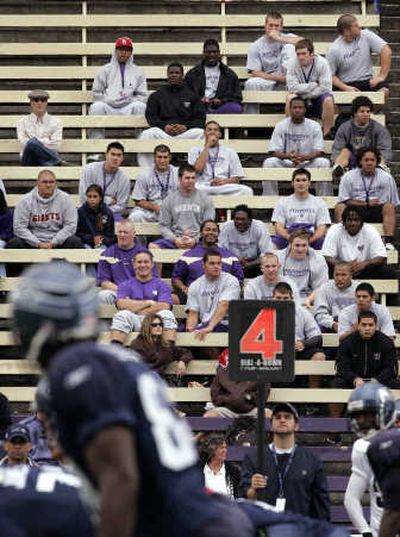 
Husky football players watch the Seahawks during a workout at UW. Associated Press
 (Associated Press / The Spokesman-Review)