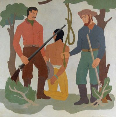 A section of a mural portraying white settlers lynching a Native American man is part of a series of Depression-era paintings in the former Ada County Courthouse, now the Idaho Law & Justice Learning Center. The two offending scenes are now covered by banners, at the request of the University of Idaho, which now has law students attending class in the building. (Associated Press / The Spokesman-Review)