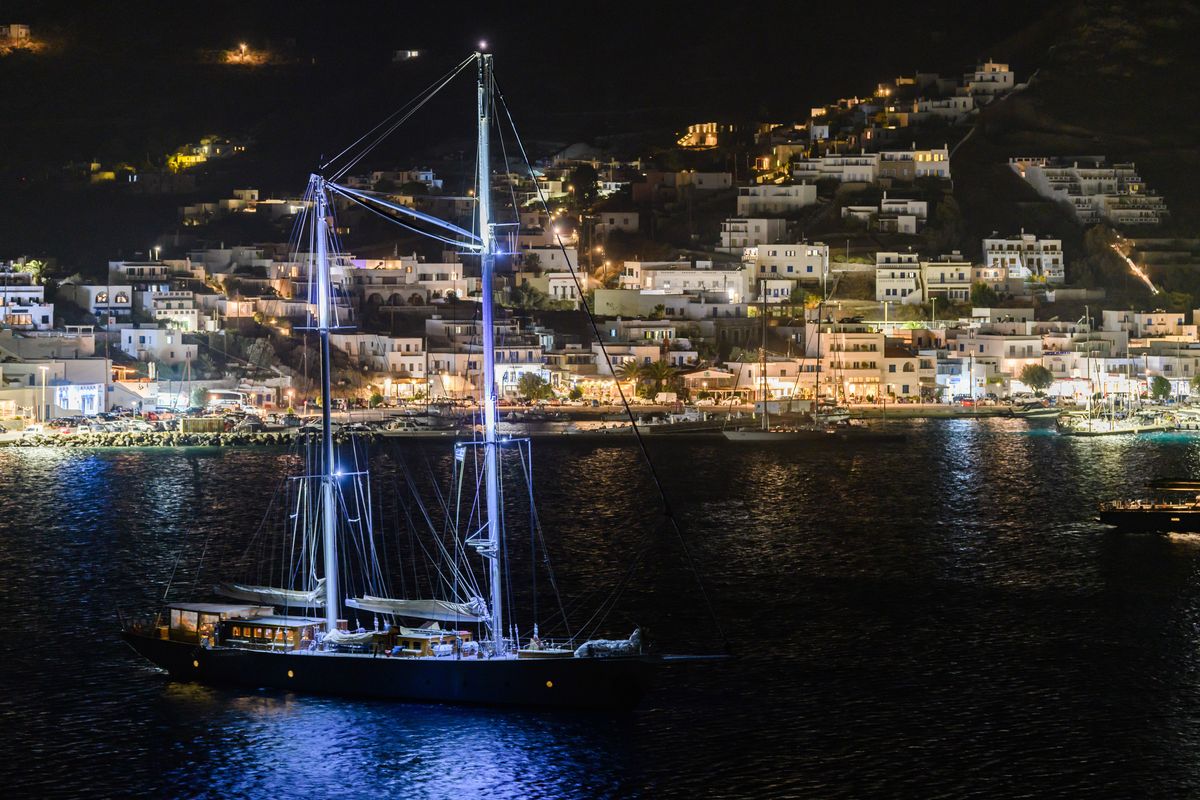 A boat in the water surrounding the Greek island of Serifos in October 2023. Serifos does not have an airport, so many visitors arrive by boat.  (MARIA MAVROPOULOU/New York Times)