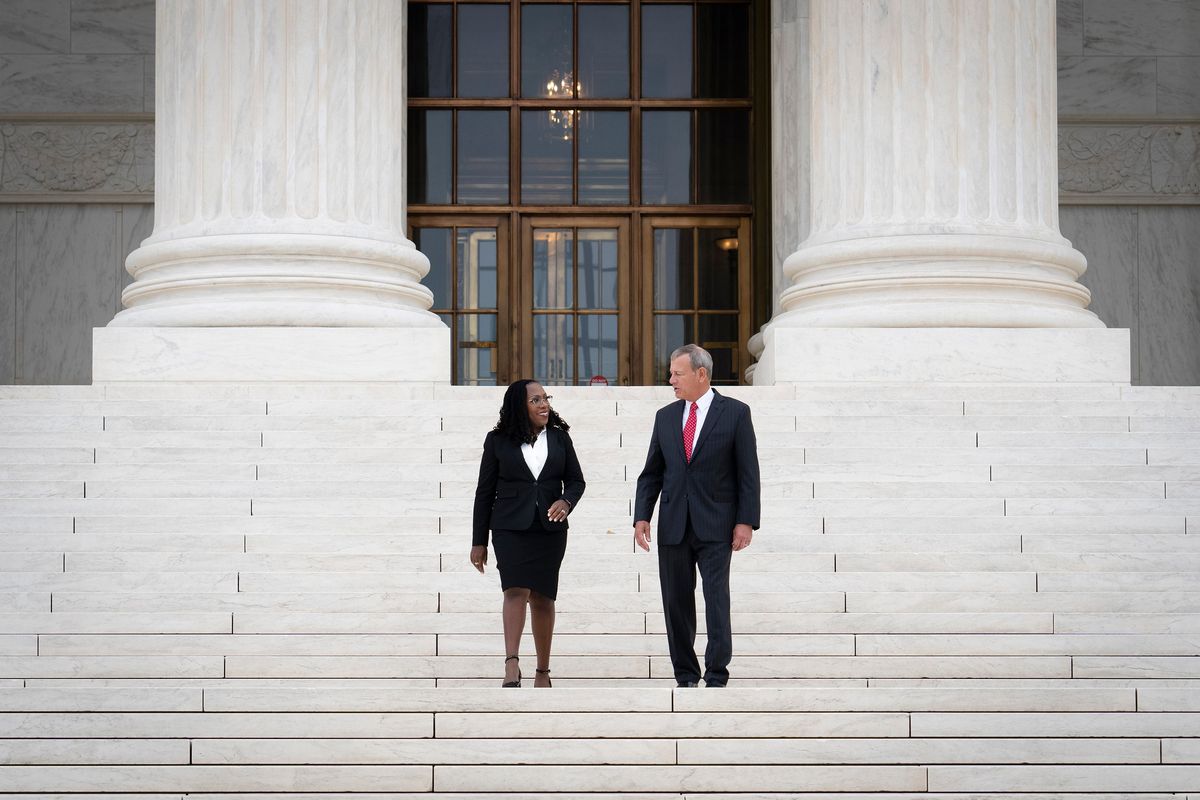 Justice Ketanji Brown Jackson and Chief Justice John Roberts stand outside the Supreme Court after her Investiture Ceremony in Washington on Friday, Sept. 30, 2022. From her first week on the Supreme Court bench in October to the final day of the term that ended last week, Justice Jackson did something remarkable for a junior justice: She established herself as a distinctive voice on the court. (New York Times)
