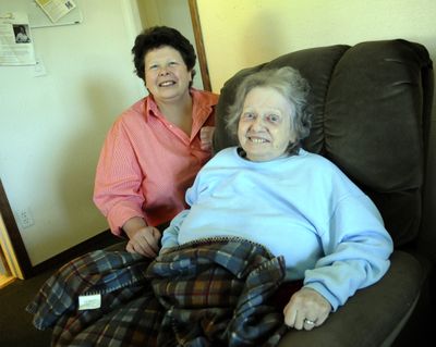 Marilyn Gleeson sits with her mother, Eileen Fringer, in a converted wheelchair-accessible garage, where Gleeson  (J. BART RAYNIAK)