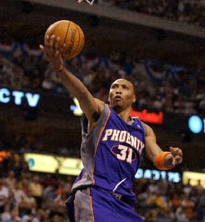 
Shawn Marion had a playoff career-best 38 points and also had 16 rebounds to help Phoenix end Dallas' season. 
 (Associated Press / The Spokesman-Review)