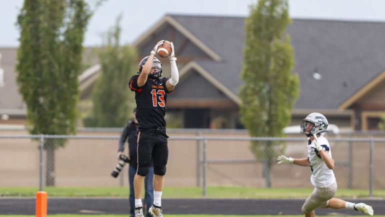 Post Falls receiver Tommy Hauser, who has 52 receptions this season, gathers his second touchdown catch against Lake City during a 34-13 nonleague home win on Sept. 19. (Cheryl Nichols/For The Spokesman-Review)