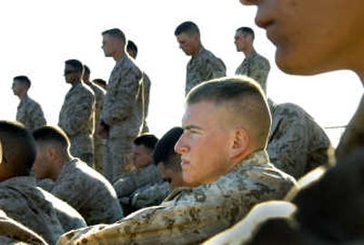 
Topside instructions: Lance Cpl. Robert Shipp listens to his commander aboard the USS Germantown during a seven-month deployment in the Persian Gulf.  
 (Photos by BRIAN PLONKA / The Spokesman-Review)