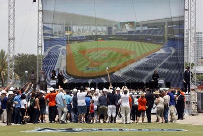 Florida Marlins fans watch the groundbreaking ceremony.  (Associated Press / The Spokesman-Review)