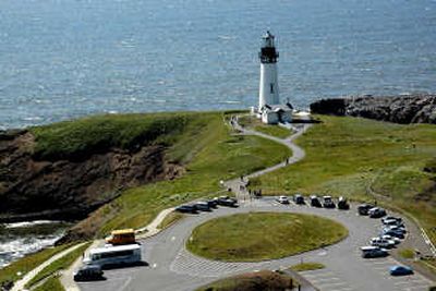 
Yaquina Head Lighthouse, built in 1872, is the tallest light on the Oregon Coast. The structure has become a tourist attraction with more than 400,000 visitors every year.
 (photos by Mike Brodwater / The Spokesman-Review)