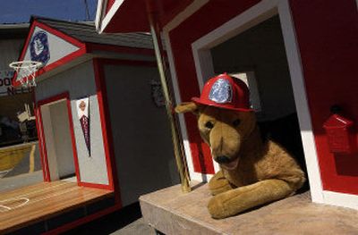 
St. Vincent de Paul is raising funds to replace two of its trucks and repair its other trucks by selling raffle tickets for a chance to win themed dog houses.
 (Jed Conklin / The Spokesman-Review)