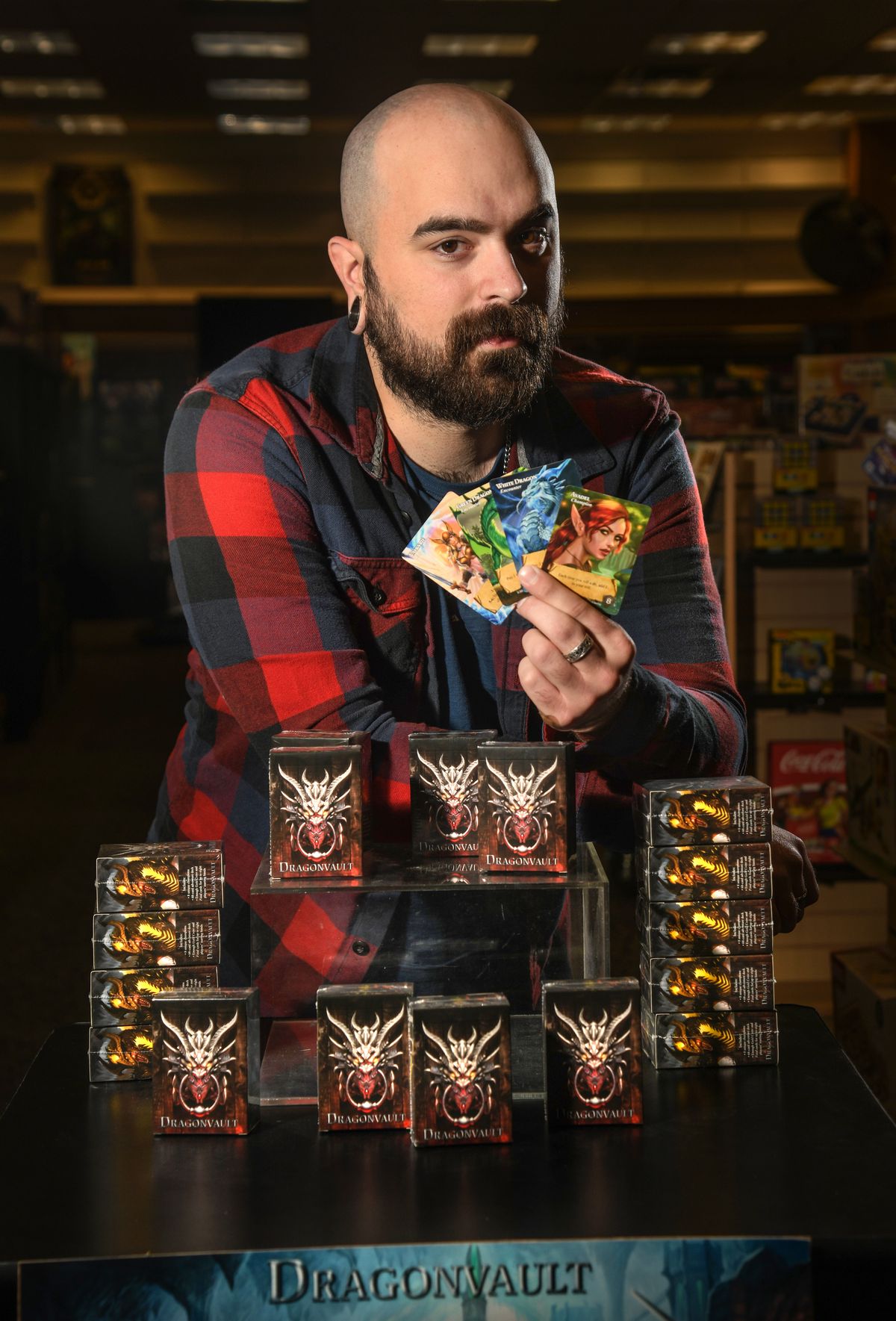 Frederick Blauer of Spokane Valley recently developed Dragonvault, a simple but fun card game that’s based on fantasy adventuring. It’s had successful sales at the Uncle’s Games store at Spokane Valley Mall.  (Dan Pelle/The Spokesman-Review)