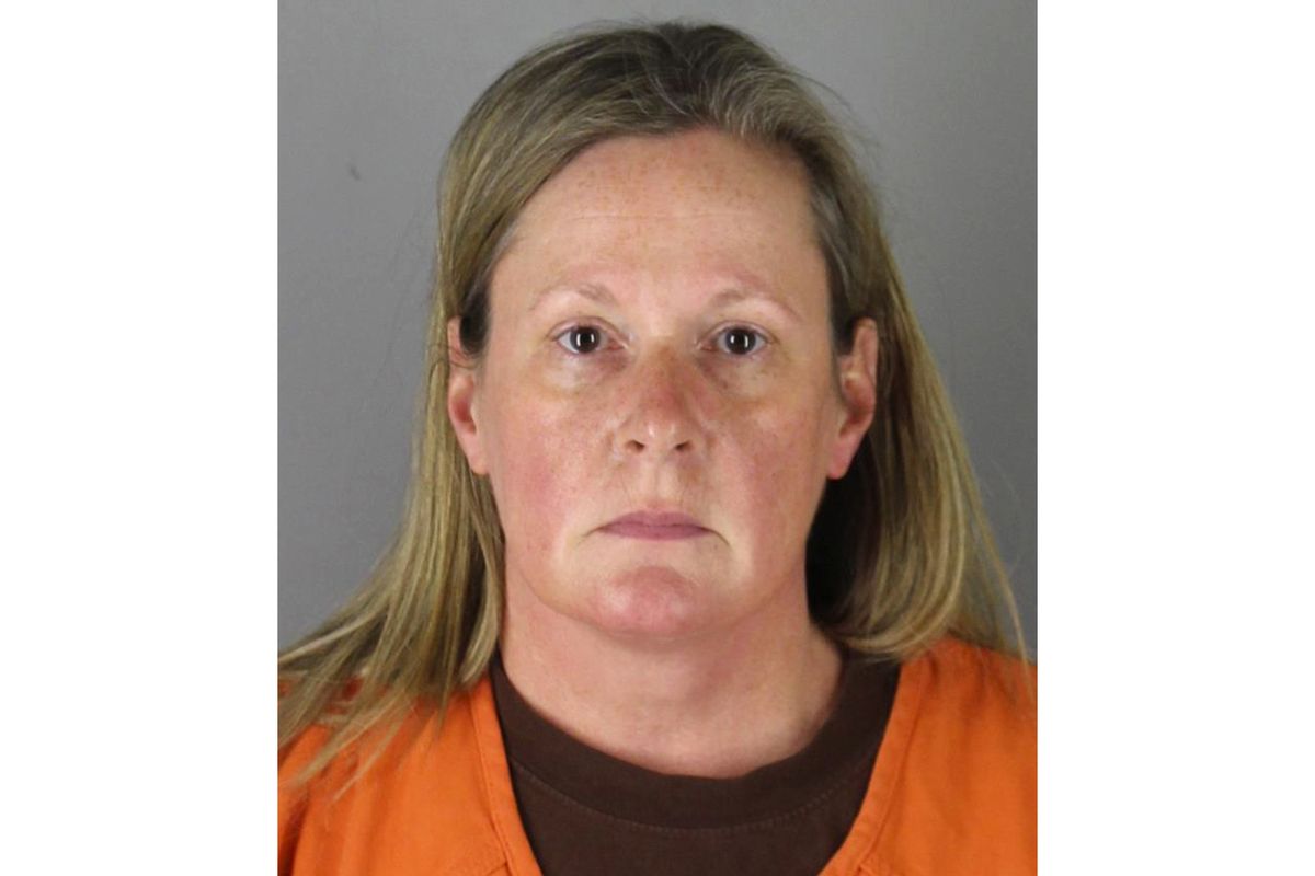 This booking photo released by the Hennepin County, Minn., Sheriff shows Kim Potter, a former Brooklyn Center, Minn., police officer who is charged Wednesday, April 14, 2021, with second-degree manslaughter for killing 20-year-old Black motorist Daunte Wright in a shooting that ignited days of unrest and clashes between protesters and police.  (HOGP)