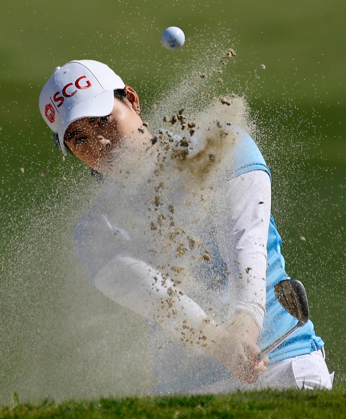 Moriya Jutanugarn, of Thailand, hits out of a bunker on the 18th hole during the second round of the HUGEL-JTBC LA Open golf tournament at Wilshire Country Club, Friday, April 20, 2018, in Los Angeles. (Mark J. Terrill / Associated Press)
