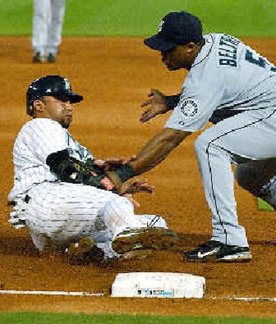 
Seattle third baseman Adrian Beltre tags out Florida's Alex Gonzalez earlier this season in Miami.
 (Associated Press / The Spokesman-Review)