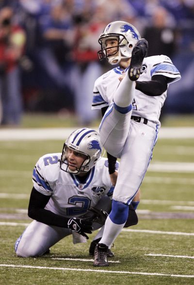 Jason Hanson, right, has been a bright spot in an otherwise dismal season for the winless Detroit Lions. His 41 career field goals from 50 yards and beyond is an NFL record. (Associated Press / The Spokesman-Review)