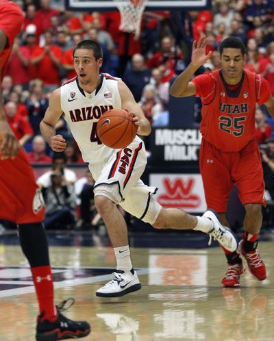 T.J. McConnell and the Wildcats set Arizona record with 20th straight win. (Associated Press)