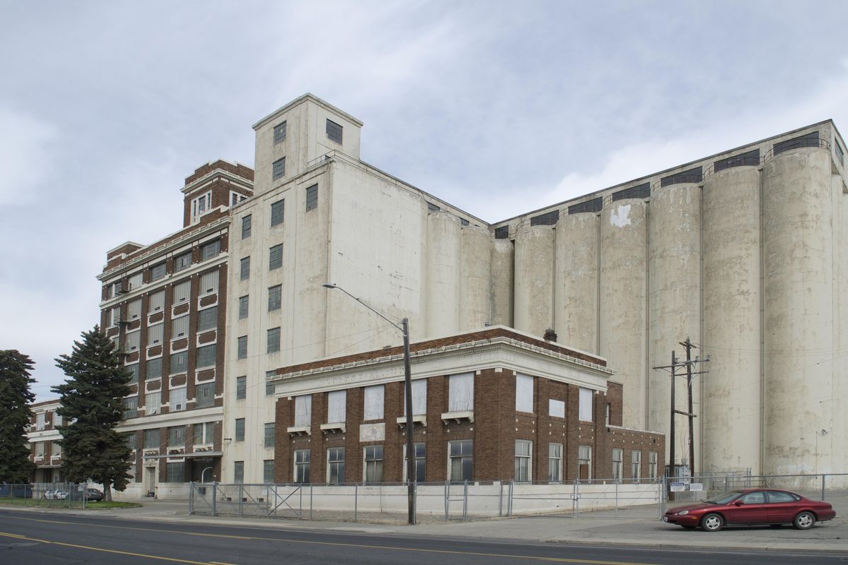 Present day: The 1918 Sperry Flour Mill on the 1200 block of East Sprague Avenue still stands, largely unchanged except for the deterioration from almost a century of use and weather. The silos, the seven-story mill building and the 43,000-square-foot warehouse were the biggest in Spokane when the plant was built. Agribusiness giant ADM owns and operates the mill as a mix plant. (Jesse Tinsley / The Spokesman-Review)