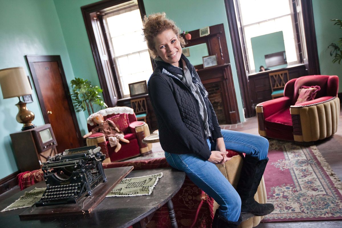 Rebecca Jordan sits in the newly renovated superintendent’s office at the Trans-Allegheny Lunatic Asylum in Weston, W.Va.