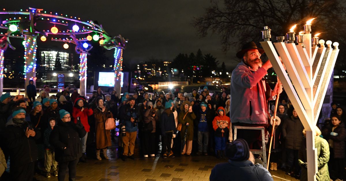 ‘When the light is most needed is when it is most dark’: Hundreds gather at Riverfront Park for Hanukkah celebration in wake of tragedy in Australia
