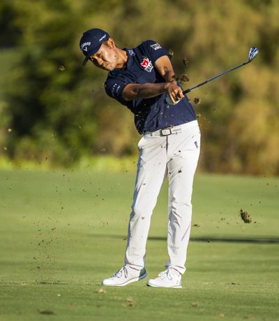 Kevin Na will take a two-stroke lead into the final round after firing a 10-under 61 in the third round of the Shriners Hospitals for Children Open golf tournament at TPC Summerlin in Las Vegas on Saturday. (L.E. Baskow / Associated Press)