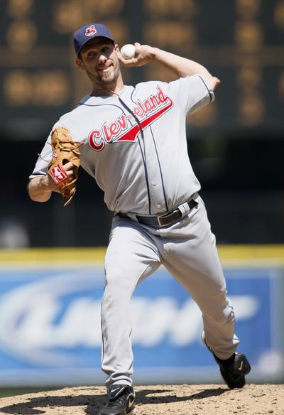 Indians starter Cliff Lee earned his seventh victory of the season. (Associated Press / The Spokesman-Review)
